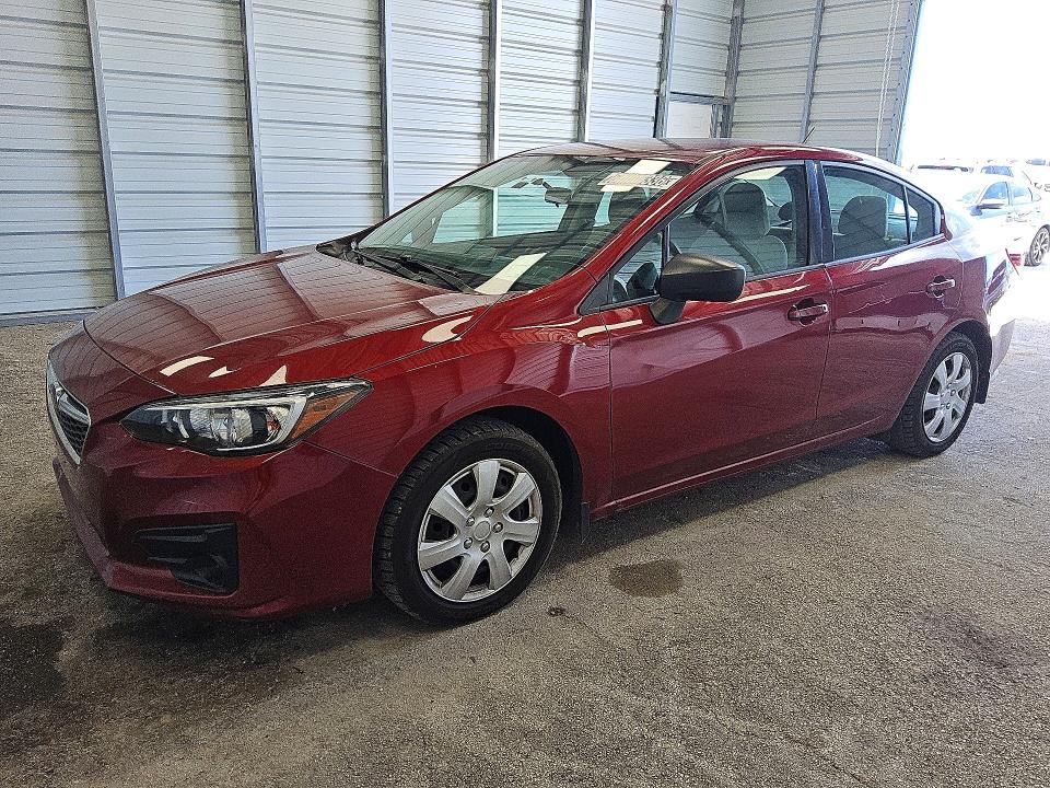 SUBARU IMPREZA 2017 with VIN 4S3GKAA60H3601937 - Photo from auction