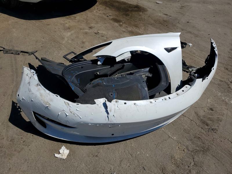 Photo 12 from auction – 2022 TESLA MODEL 3 with VIN 5YJ3E1EC5NF209069