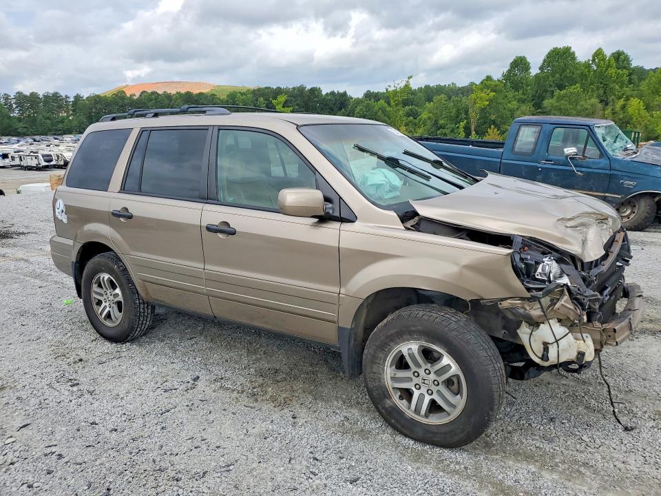 Photo 4 from auction – 2004 HONDA PILOT with VIN 2HKYF18524H557122