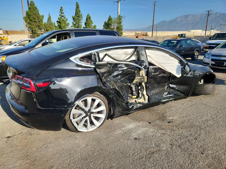 Photo 3 from auction – 2018 TESLA MODEL 3 with VIN 5YJ3E1EA0JF154572