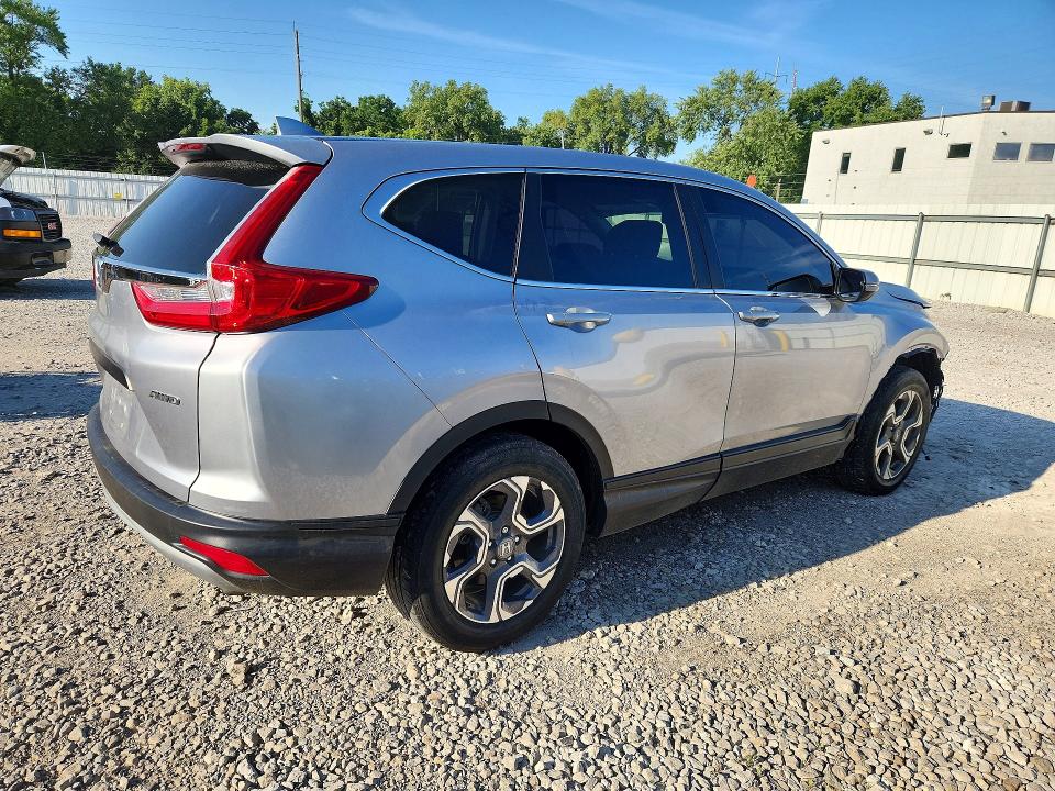 Photo 3 from auction – 2018 HONDA CR-V with VIN 7FARW2H5XJE012231