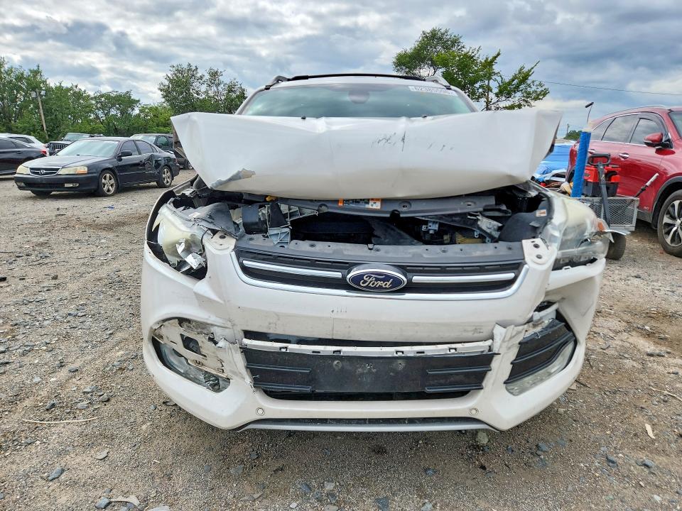 Photo 5 from auction – 2015 FORD ESCAPE with VIN 1FMCU9J93FUB29169