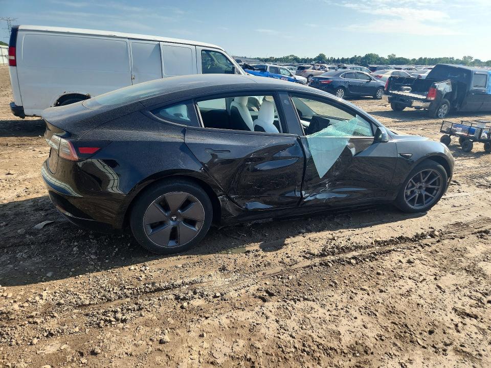 Photo 3 from auction – 2023 TESLA MODEL 3 with VIN 5YJ3E1EAXPF685951