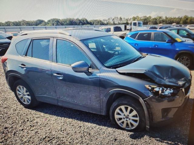 Photo 4 from auction – 2015 MAZDA CX-5 with VIN JM3KE2CYXF0443134