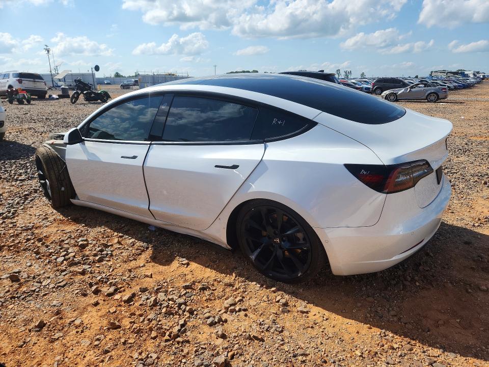 Photo 2 from auction – 2021 TESLA MODEL 3 with VIN 5YJ3E1EB0MF054971