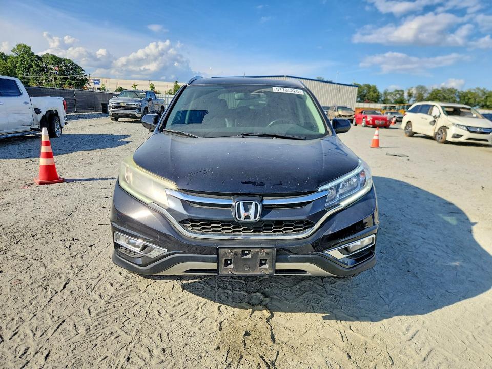 Photo 5 from auction – 2015 HONDA CR-V with VIN 2HKRM4H7XFH656593