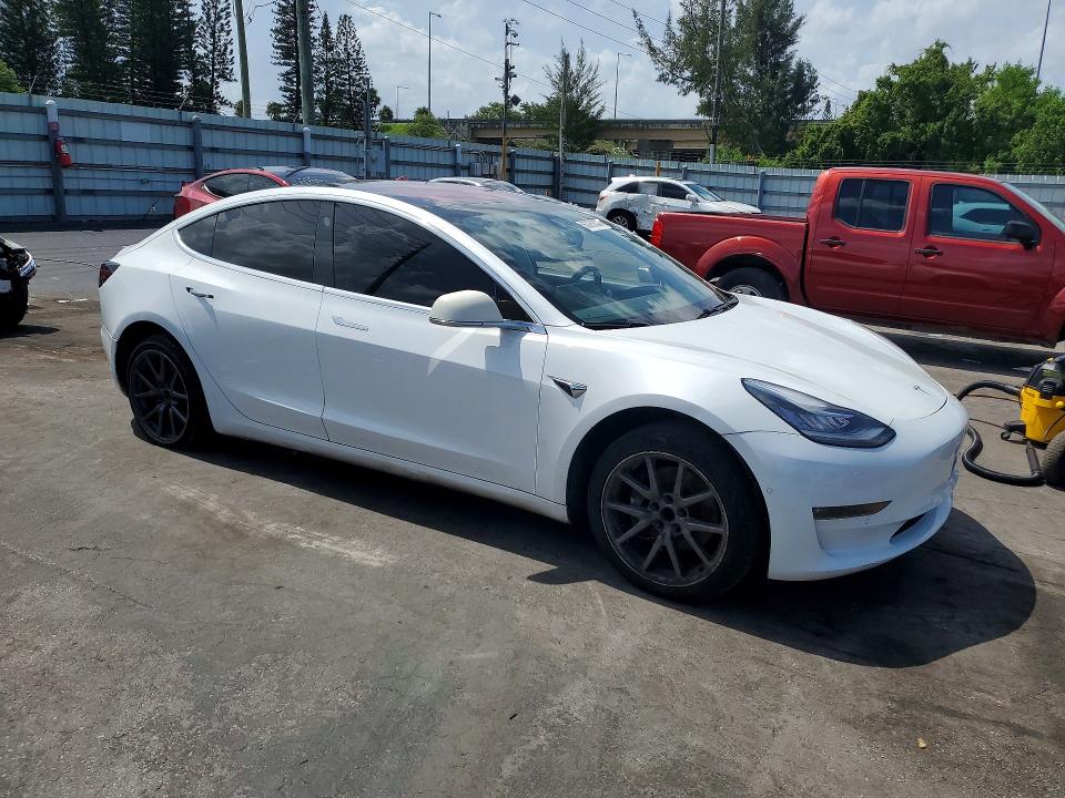 Снимка 4 от търг – 2018 TESLA MODEL 3 с VIN 5YJ3E1EA7JF007505