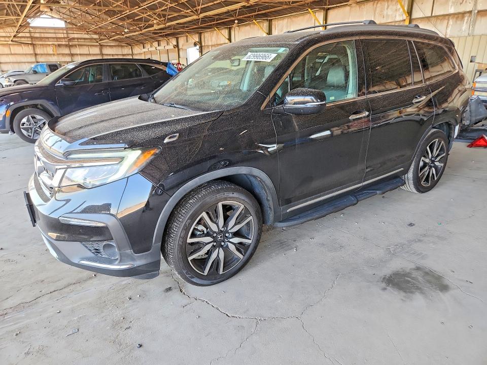 HONDA PILOT 2021 with VIN 5FNYF5H95MB021936 - Photo from auction