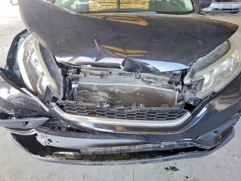 Photo 12 from auction – 2016 HONDA CR-V with VIN 3CZRM3H30GG703531