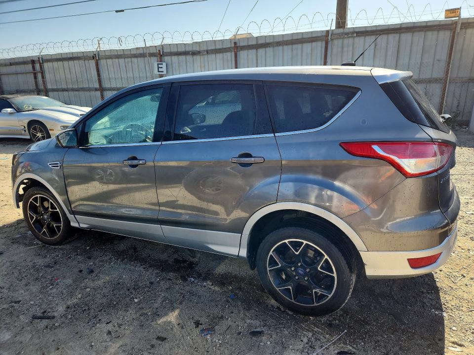 Photo 2 from auction – 2014 FORD ESCAPE with VIN 1FMCU0GX5EUE13872