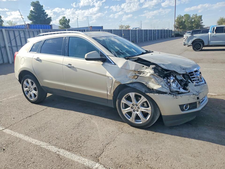 Photo 4 from auction – 2014 CADILLAC SRX with VIN 3GYFNFE36ES527486