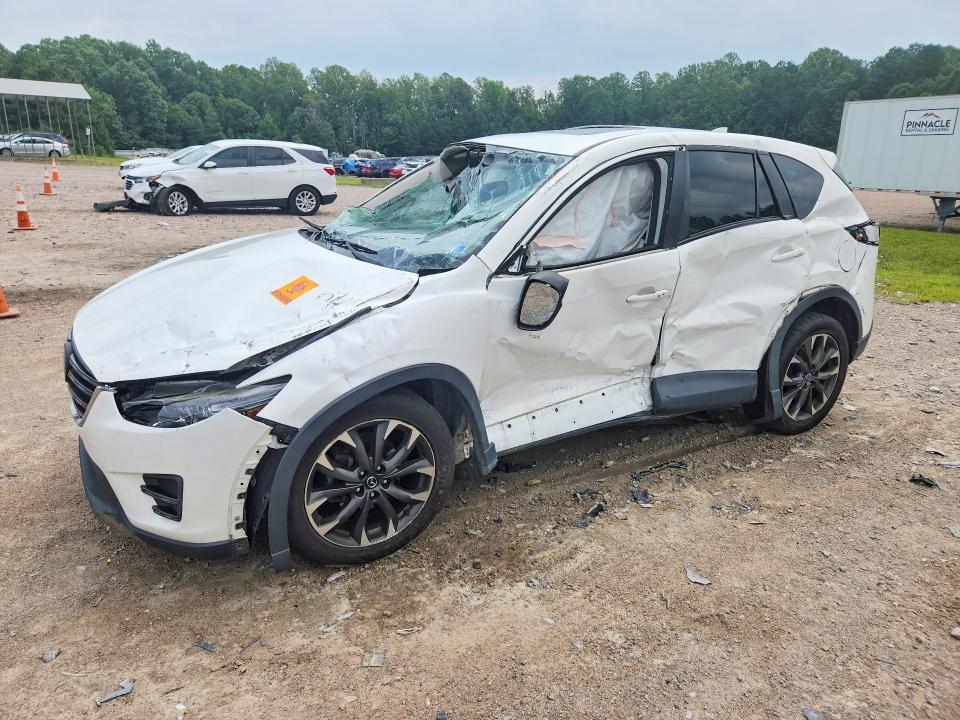 MAZDA CX-5 2016 z numerem VIN JM3KE4DY8G0877998 - Zdjęcie z aukcji