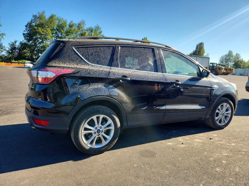 Foto 3 de la subasta – 2018 FORD ESCAPE con VIN 1FMCU9GD8JUC90038