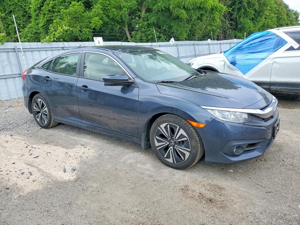 Photo 4 from auction – 2018 HONDA CIVIC with VIN JHMFC1F72JX031253