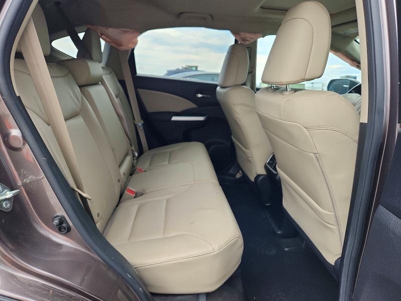 Photo 11 from auction – 2016 HONDA CR-V with VIN 2HKRM4H71GH626268