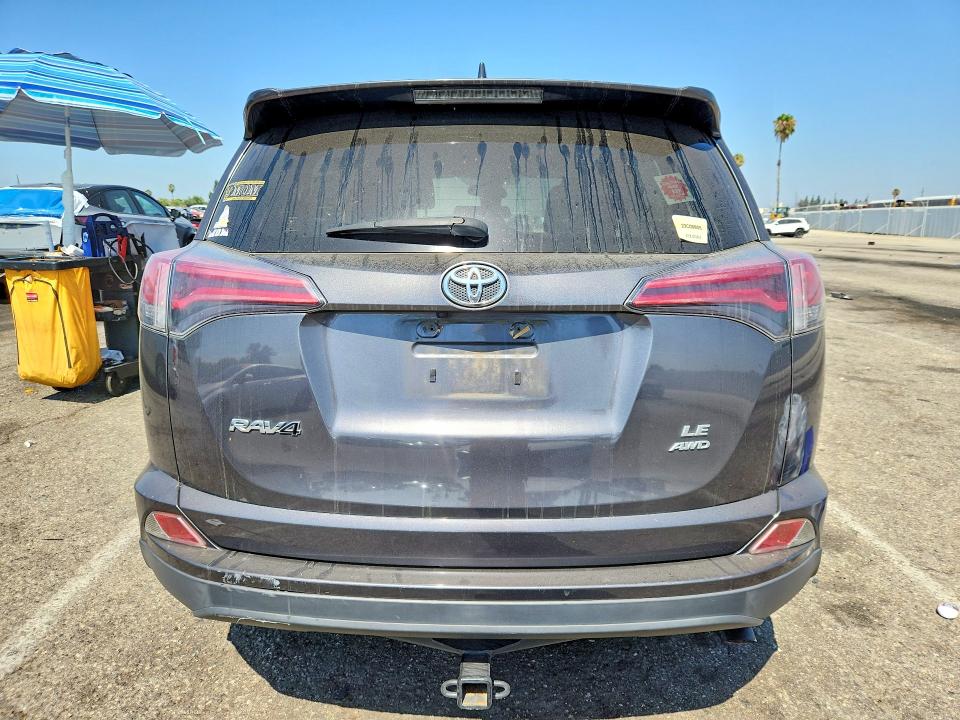 Photo 6 from auction – 2017 TOYOTA RAV4 with VIN JTMBFREV9HJ715476