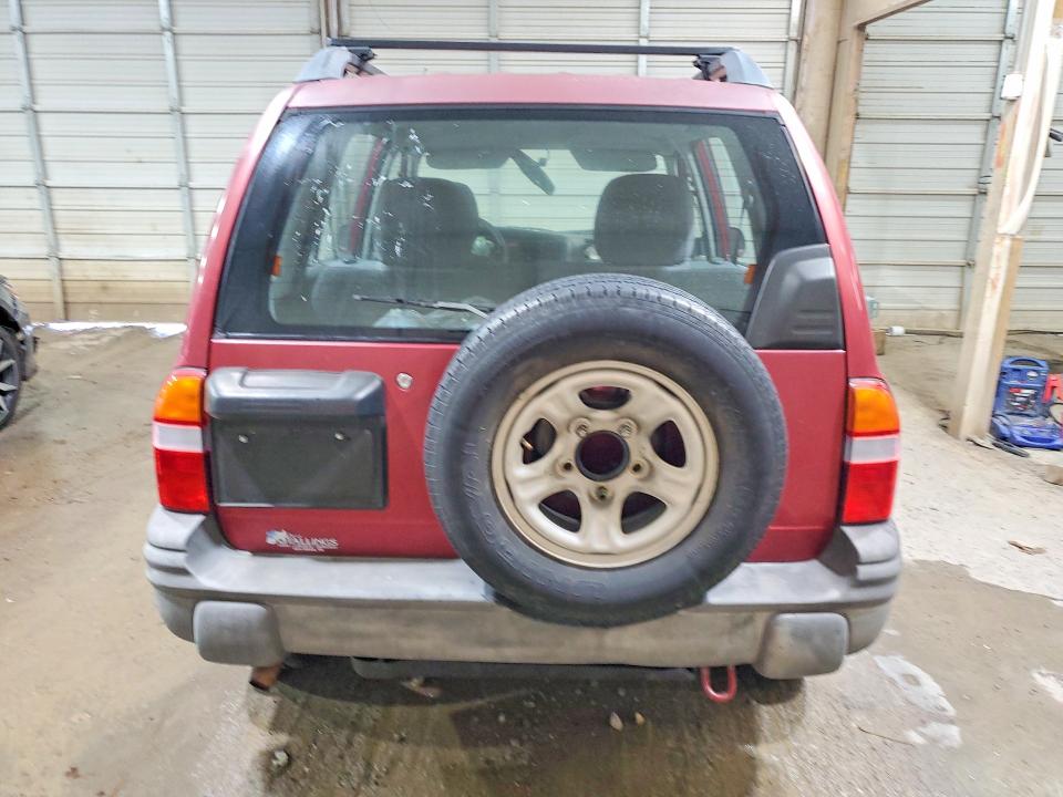 Foto 6 de la subasta – 2000 CHEVROLET TRACKER con VIN 2CNBE13C2Y6911631