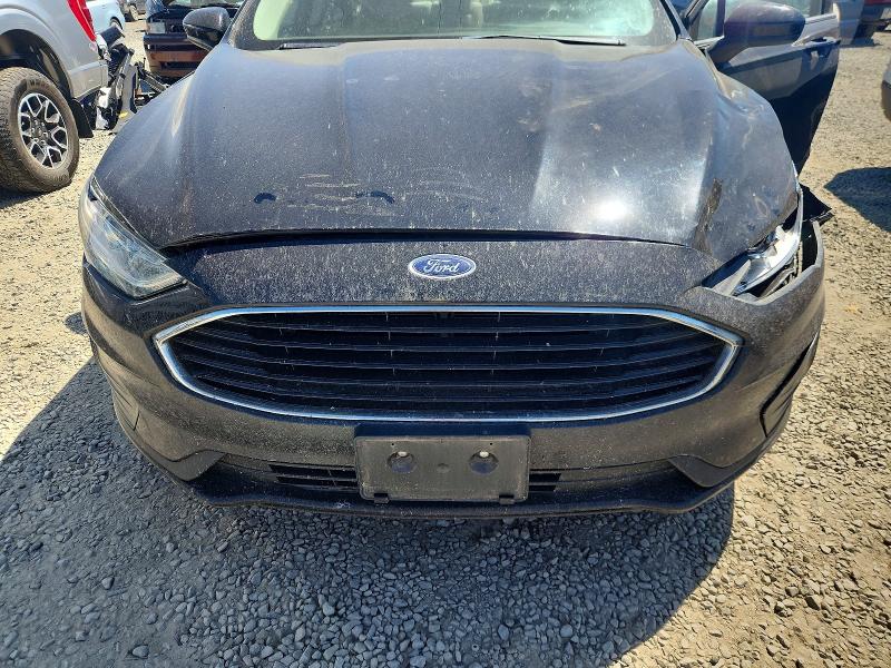Photo 11 from auction – 2020 FORD FUSION with VIN 3FA6P0G77LR234011