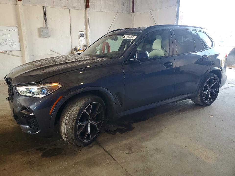 BMW X5 2022 with VIN 5UXCR6C09N9K66409 - Photo from auction