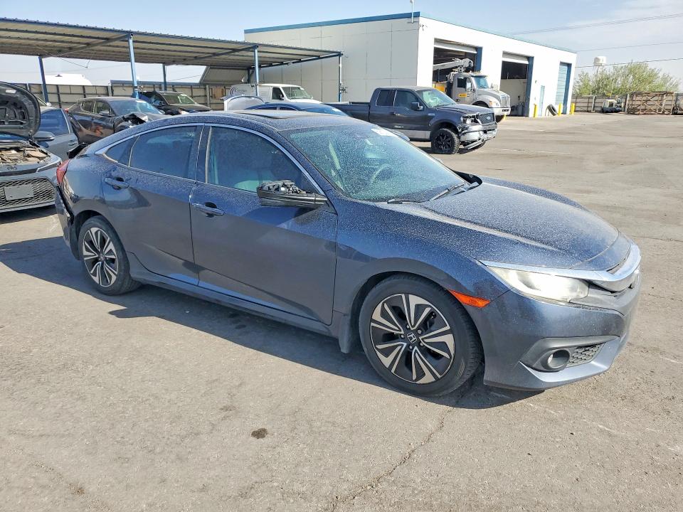 Photo 4 from auction – 2016 HONDA CIVIC with VIN 19XFC1F4XGE044073