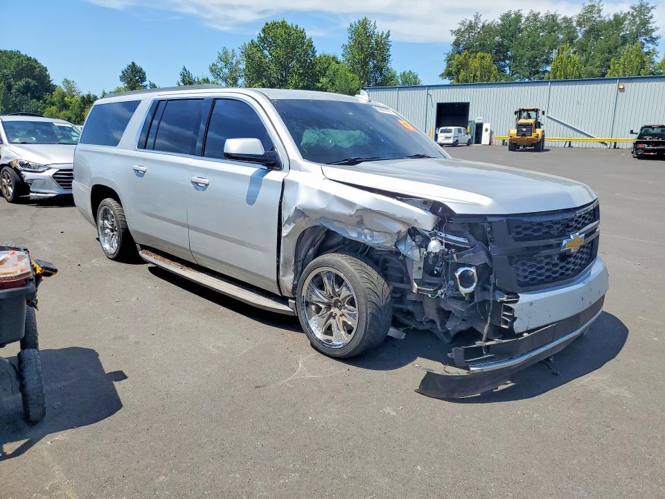 Photo 4 from auction – 2015 CHEVROLET SUBURBAN with VIN 1GNSKJKC5FR692980