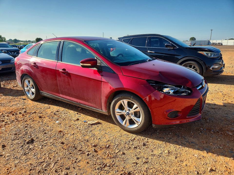 Photo 4 from auction – 2014 FORD FOCUS with VIN 1FADP3F21EL103642