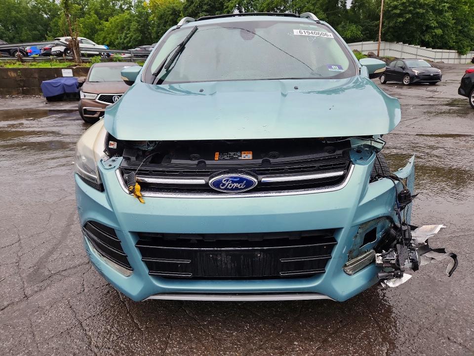 Photo 5 from auction – 2013 FORD ESCAPE with VIN 1FMCU9J95DUC32266