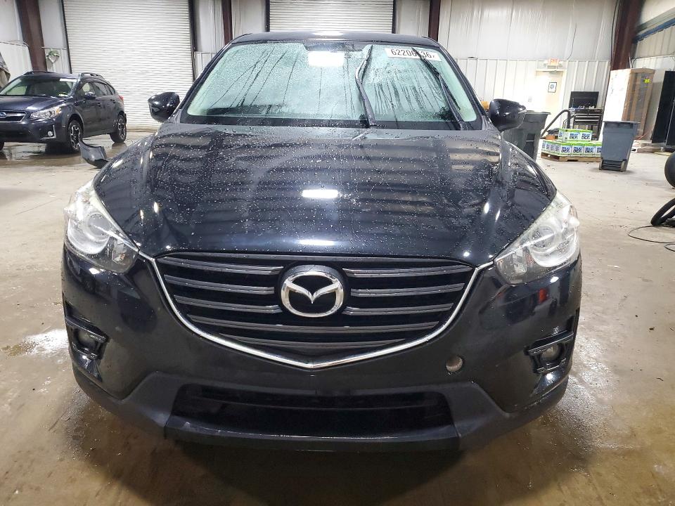 Photo 5 from auction – 2016 MAZDA CX-5 with VIN JM3KE4CY3G0865646