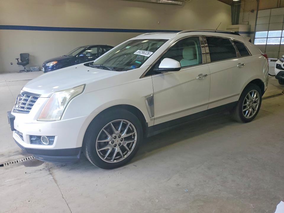 CADILLAC SRX 2014 with VIN 3GYFNDE37ES611708 - Photo from auction