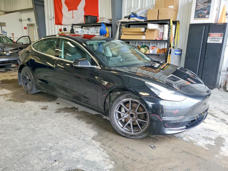 Photo 4 from auction – 2019 TESLA MODEL 3 with VIN 5YJ3E1EA7KF328705