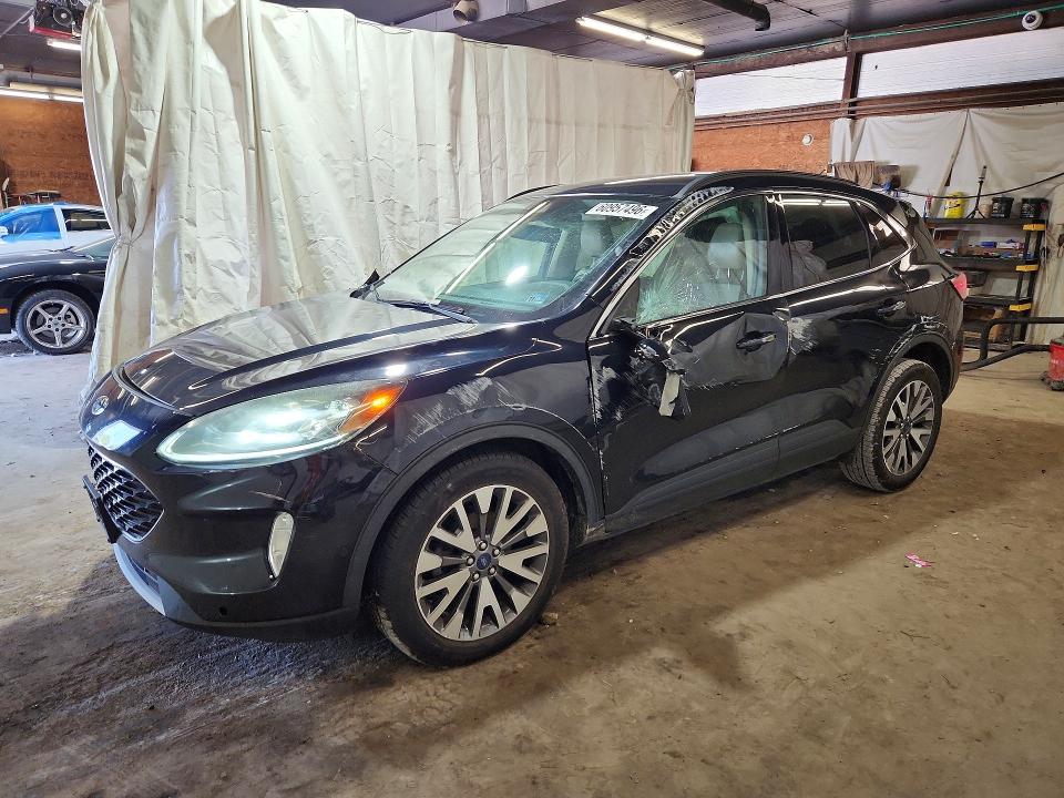FORD ESCAPE 2020 with VIN 1FMCU9J90LUA58704 - Photo from auction
