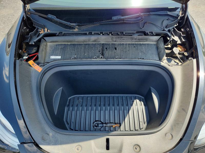 Photo 11 from auction – 2022 TESLA MODEL Y with VIN 7SAYGDEE5NA022272