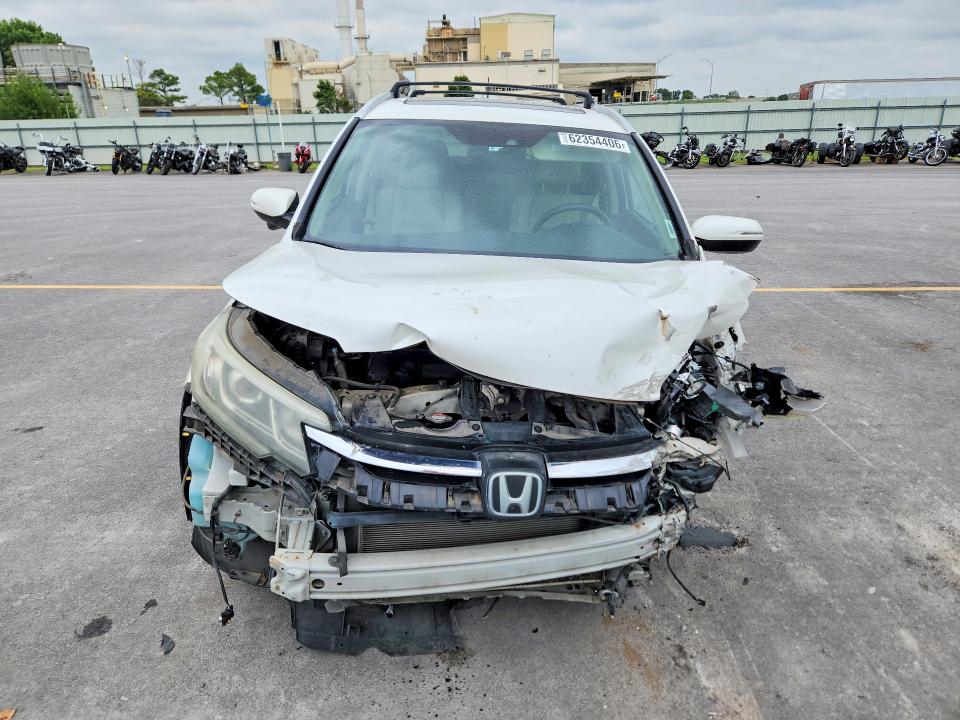 Photo 5 from auction – 2016 HONDA CR-V with VIN 5J6RM4H92GL117085