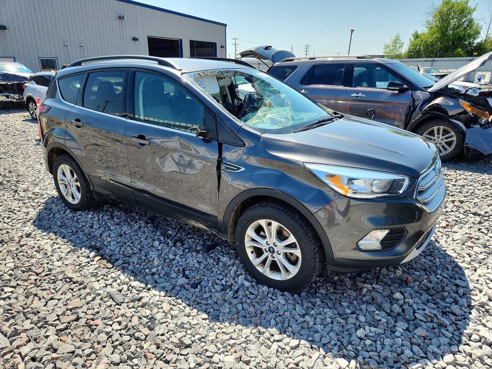 Photo 4 from auction – 2018 FORD ESCAPE with VIN 1FMCU9GD0JUC11770