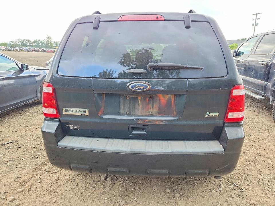 Photo 6 from auction – 2011 FORD ESCAPE with VIN 1FMCU0DG7BKB27176