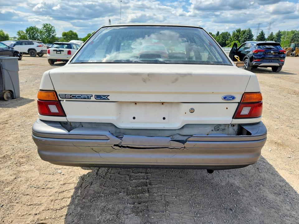 Photo 6 from auction – 1991 FORD ESCORT with VIN 1FAPP14J4MW322863