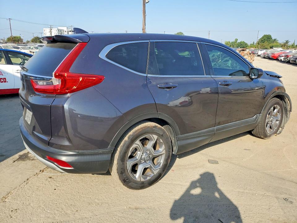 Photo 3 from auction – 2017 HONDA CR-V with VIN 7FARW1H88HE011464