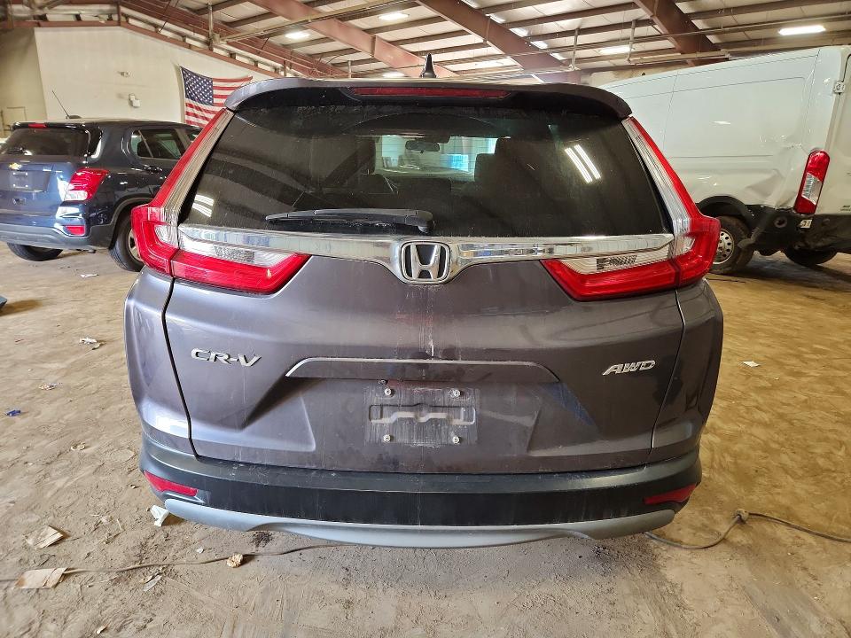 Photo 6 from auction – 2018 HONDA CR-V with VIN 7FARW2H53JE006013