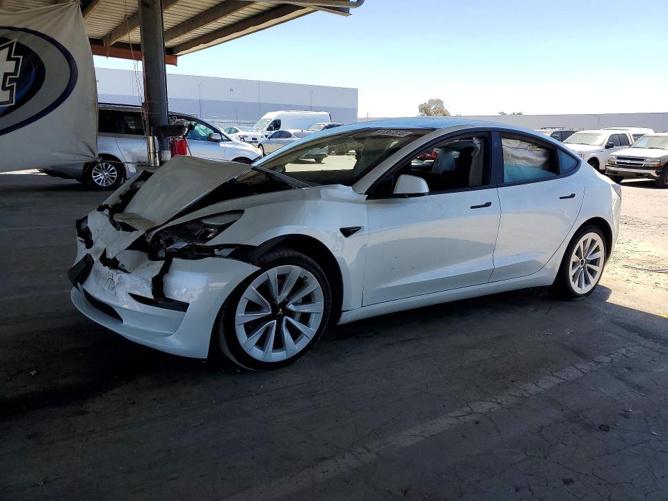 TESLA MODEL 3 2023 with VIN 5YJ3E1EB9PF592833 - Photo from auction