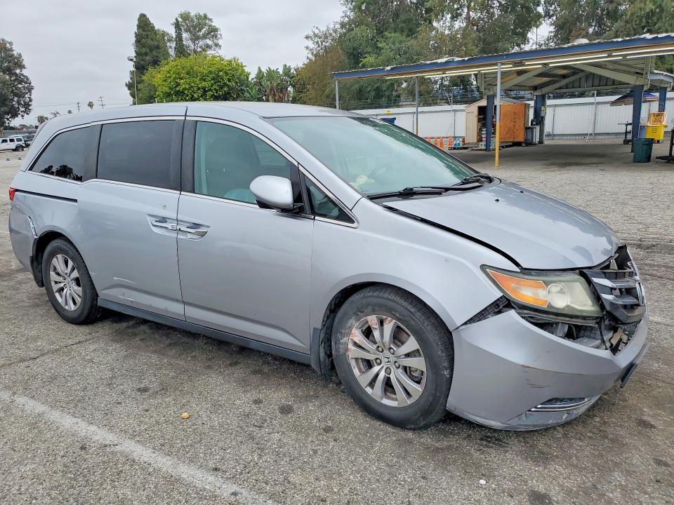 Photo 4 from auction – 2016 HONDA ODYSSEY with VIN 5FNRL5H31GB009859