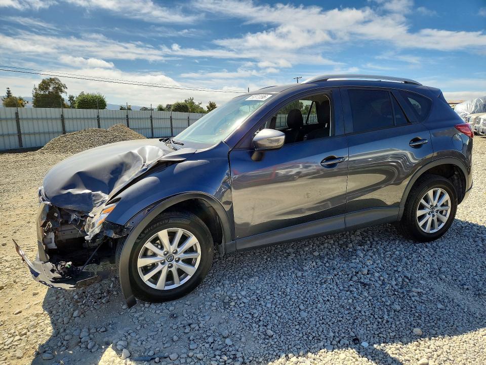 MAZDA CX-5 2016 with VIN JM3KE2CY0G0854270 - Photo from auction