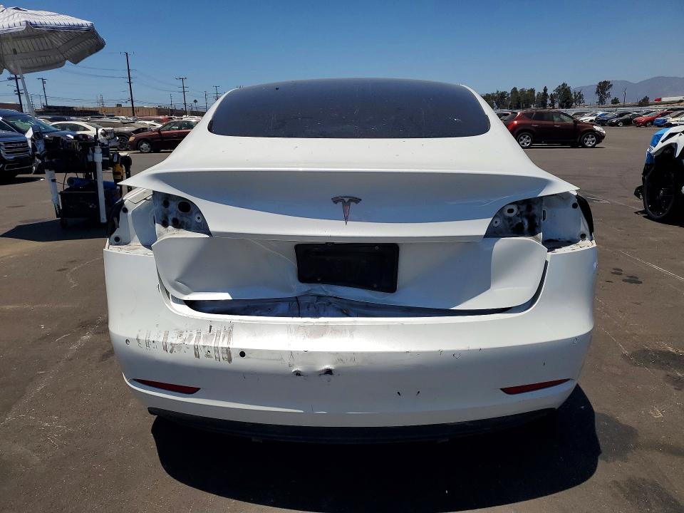 Photo 6 from auction – 2021 TESLA MODEL 3 with VIN 5YJ3E1EA3MF017856