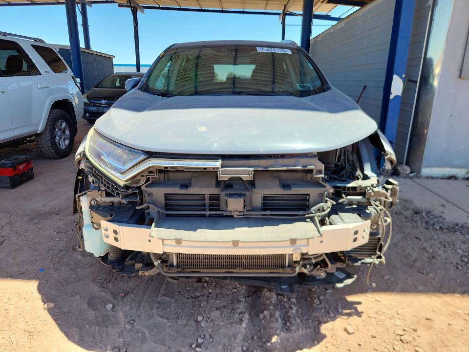 Photo 5 from auction – 2022 HONDA CR-V with VIN 5J6RT6H98NL010229