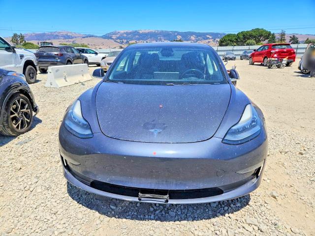 Photo 5 from auction – 2018 TESLA MODEL 3 with VIN 5YJ3E1EA0JF053483