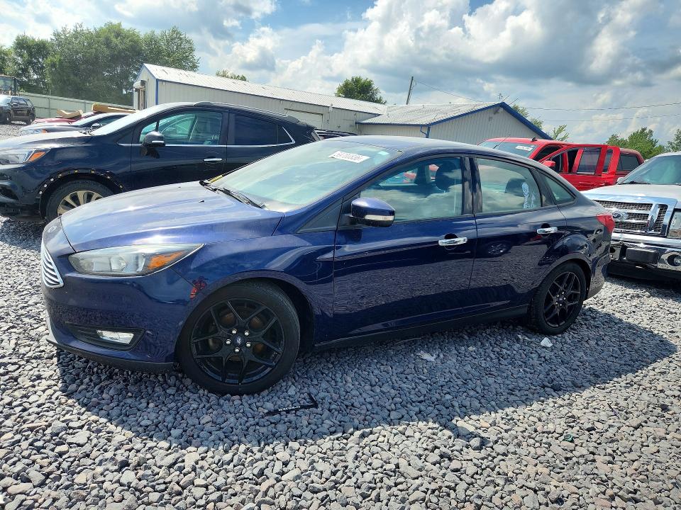 FORD FOCUS 2016 with VIN 1FADP3F27GL291571 - Photo from auction