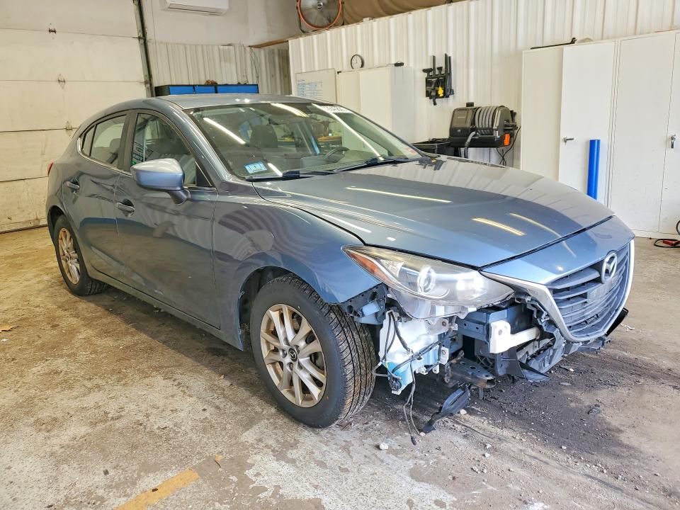 Photo 4 from auction – 2015 MAZDA 3 with VIN JM1BM1M70F1242414