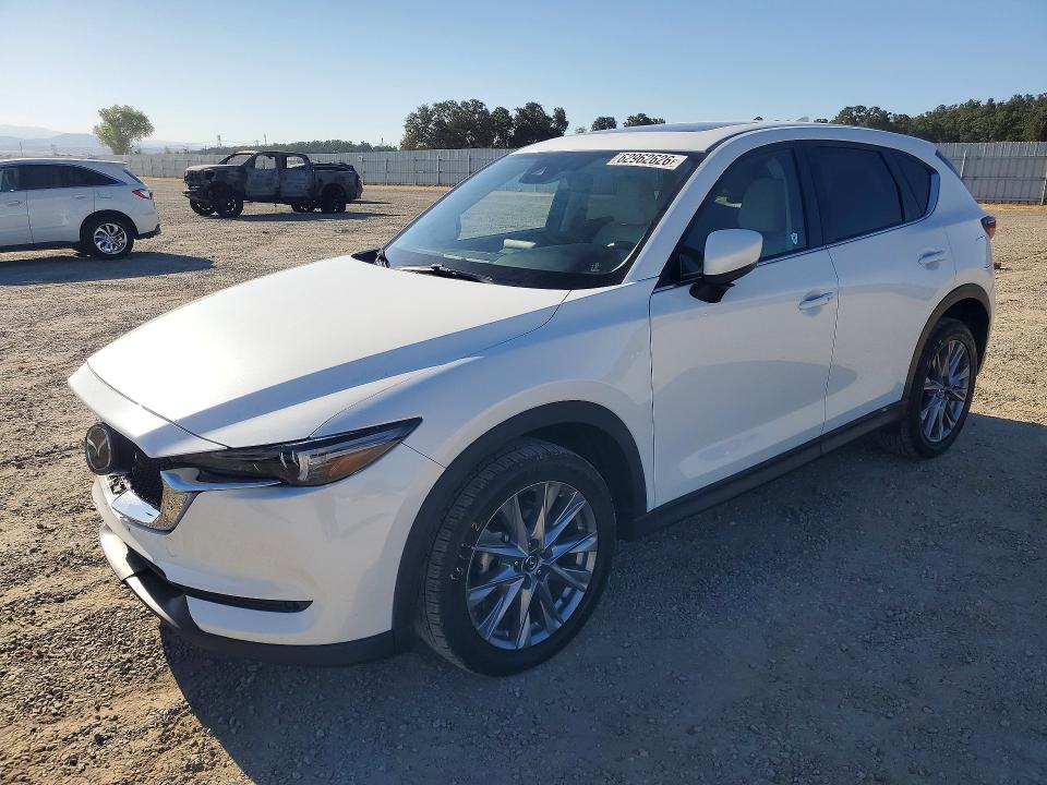 MAZDA CX-5 2020 with VIN JM3KFBDM6L0864854 - Photo from auction