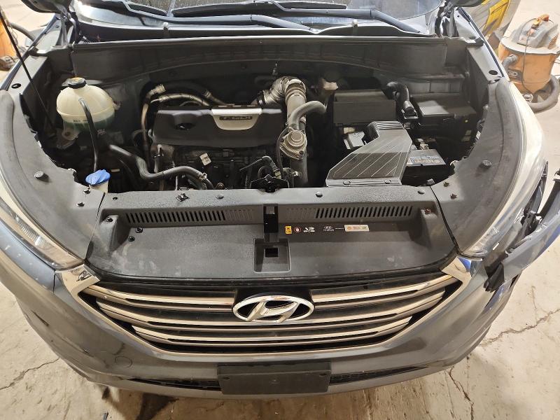 Photo 12 from auction – 2016 HYUNDAI TUCSON with VIN KM8J3CA29GU159000