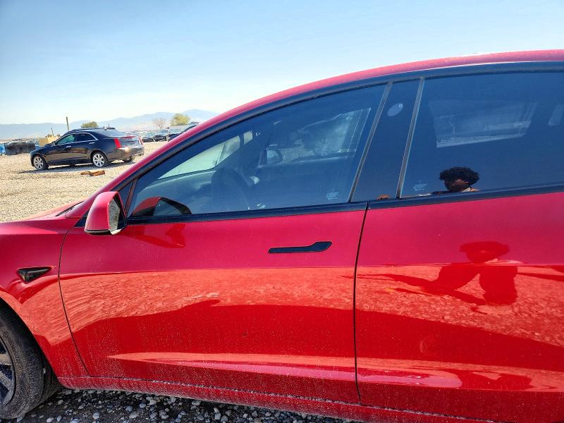 Photo 7 from auction – 2022 TESLA MODEL 3 with VIN 5YJ3E1EB7NF190354