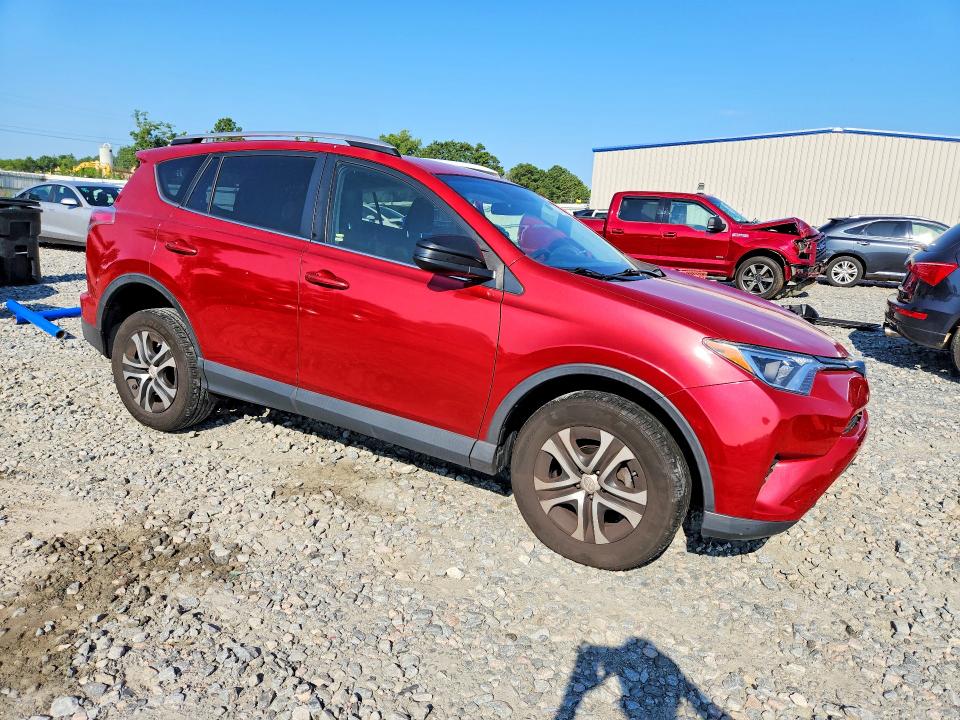 Photo 4 from auction – 2016 TOYOTA RAV4 with VIN JTMZFREV9GJ099288